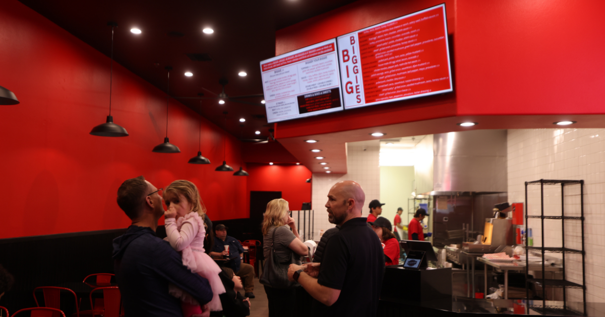 Customers ordering oversized sandwiches at BIGGIES Sandwiches open daily until 10 PM in Henderson NV